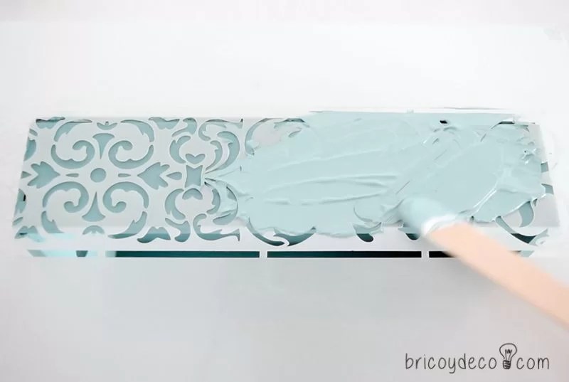 how to spread the paste on the stencil