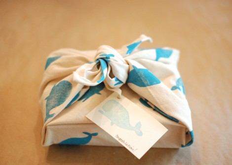 wrapping Christmas gifts with fabric scraps 