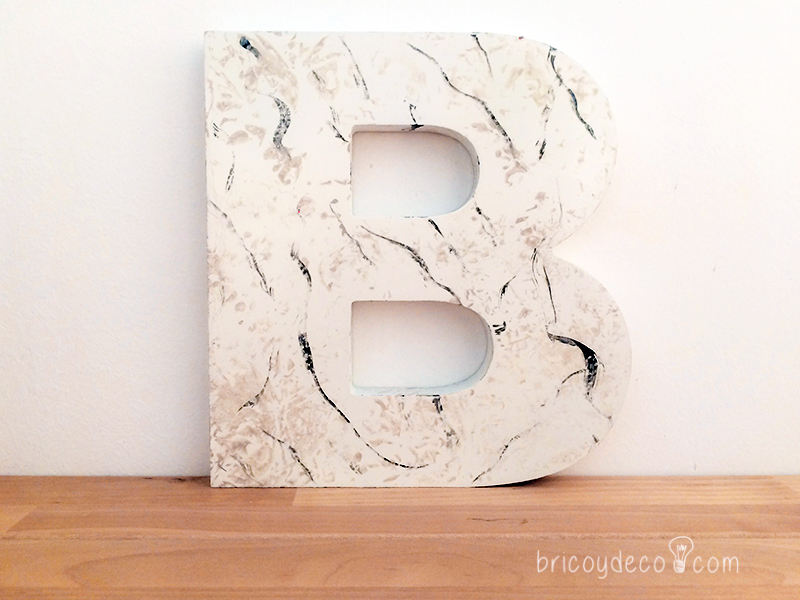 DM letter with marbled effect