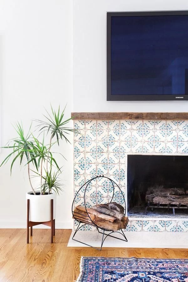 decorate the fireplace with hydraulic tiles
