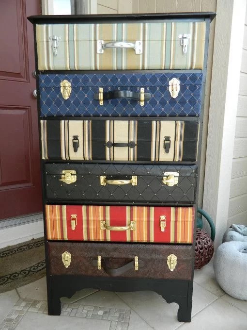 decorate with suitcases and recycle in a chest of drawers