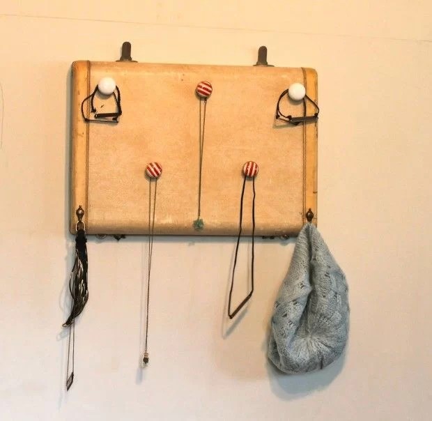 decorate with suitcases and recycle into a jewelry hanger