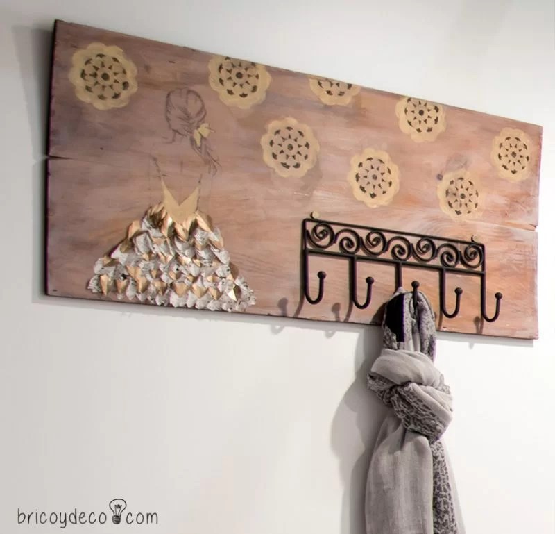 a coat rack with recycled wood