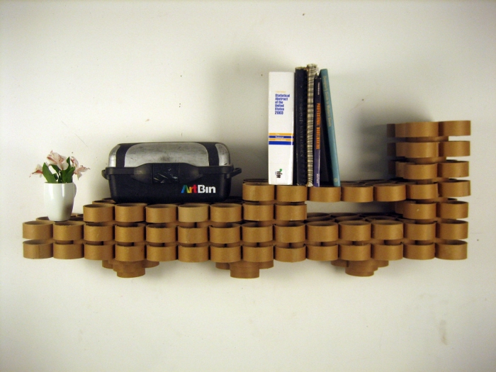Shelf with cardboard tubes 