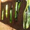 Make a wall with recycled glass bottles