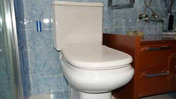 Toilet with damaged cistern